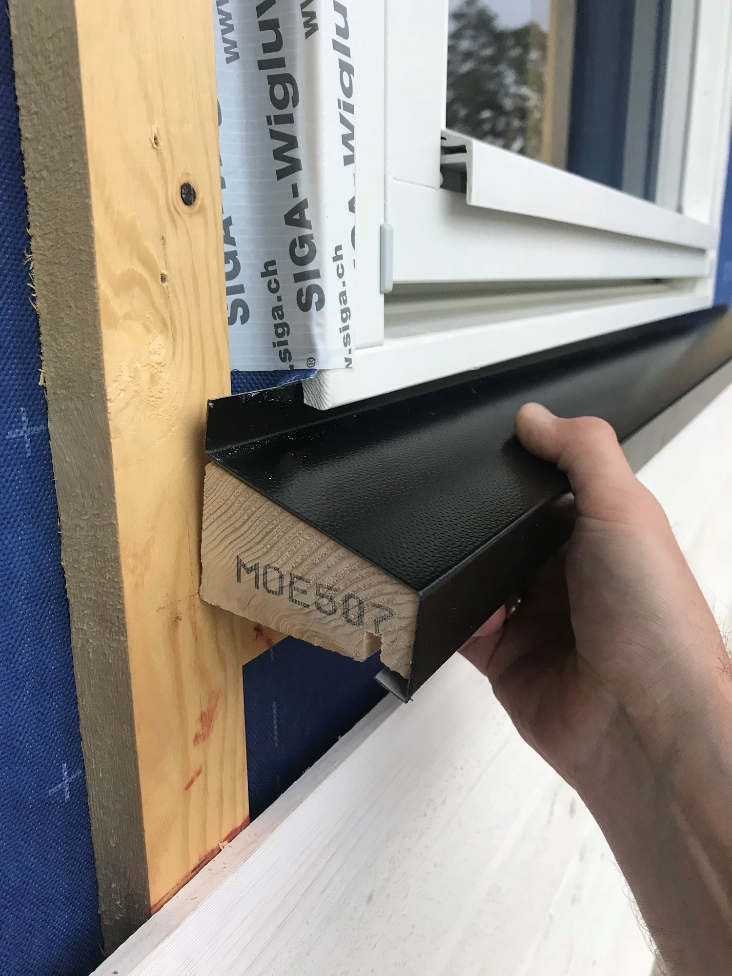 Vannbrett under vindu – tilpasset kledning
