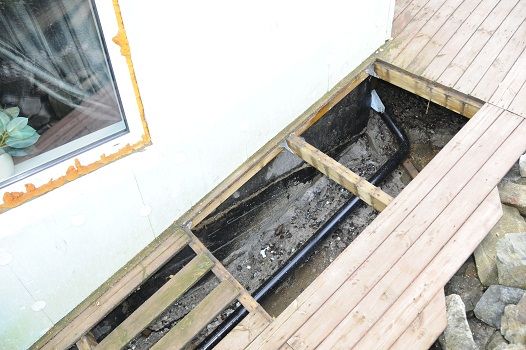 Fuktgåte i et rom delvis under fjell - 03 bilde vegg.jpg - ThoE